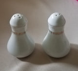 White ceramic salt and pepper shakers