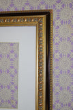 Frame, brass with black accents ornate